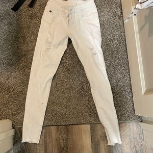 Women’s white ripped skinny jeans